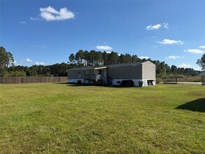 239 Road 5027 Rd in Cleveland, TX - Building Photo - Building Photo