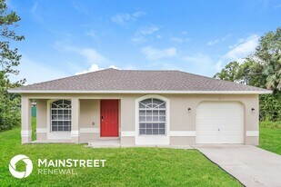 1016 Bagget St E in Lehigh Acres, FL - Building Photo