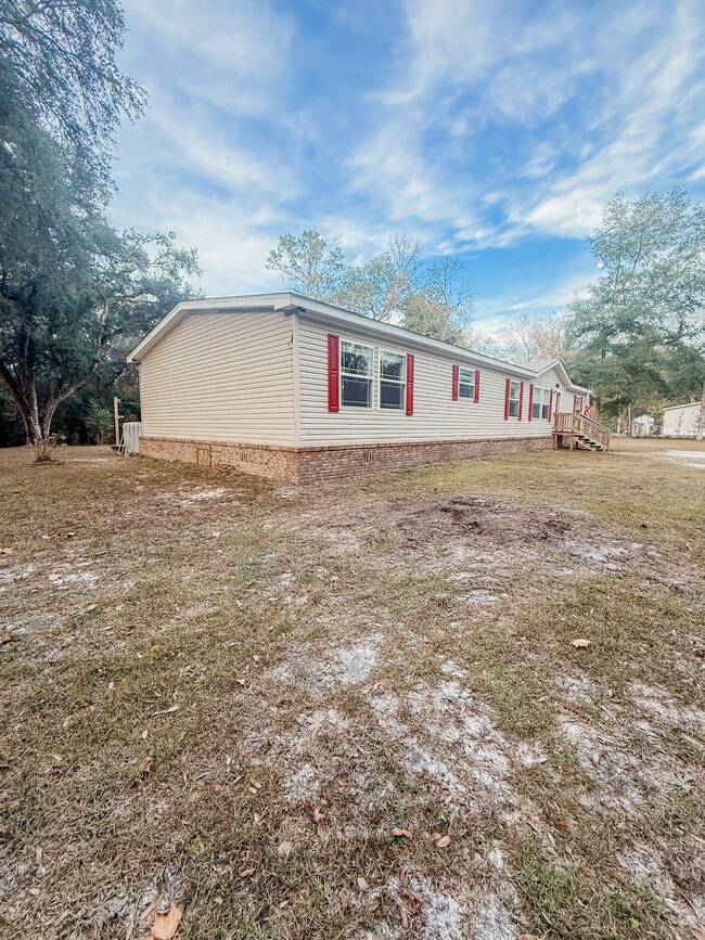 106 Dolly Dr in Crawfordville, FL - Building Photo - Building Photo