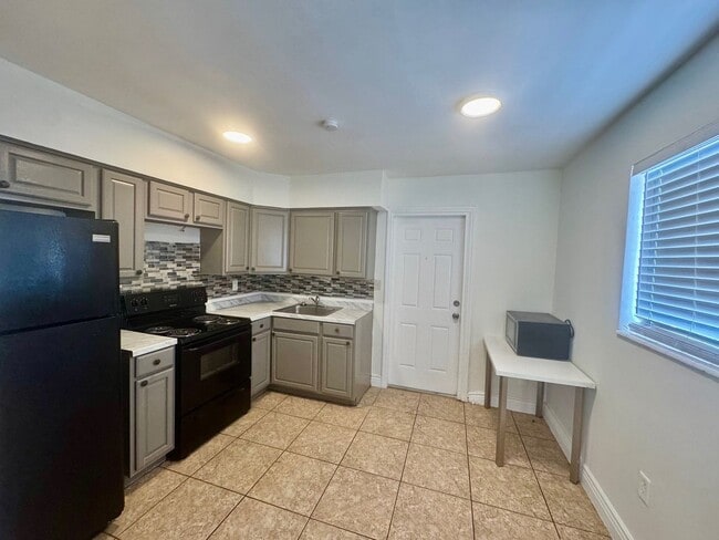 property at 2633-2635 NW 9th Ave