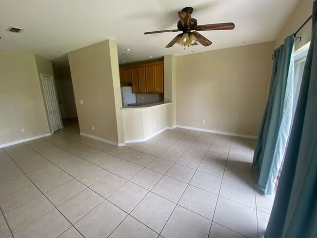 9448 Flowering Cottonwood Rd in Orlando, FL - Building Photo - Building Photo