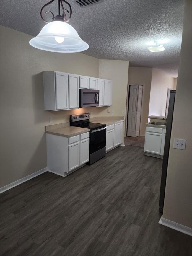 311 Sunset View Dr in Davenport, FL - Foto de edificio - Building Photo