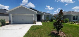 875 Orleans Dr in Eagle Lake, FL - Building Photo