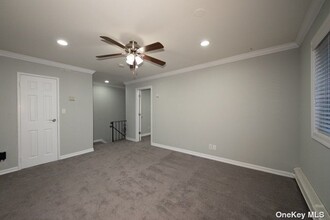54 Horseblock Rd, Unit 54-4A in Centereach, NY - Building Photo - Building Photo
