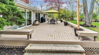 8 Coolidge Ln in East Quogue, NY - Foto de edificio - Building Photo