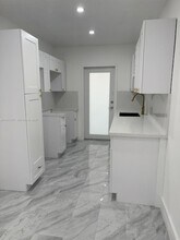 6890 Abbott Ave, Unit 3A in Miami Beach, FL - Foto de edificio - Building Photo