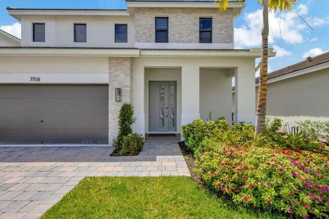 7158 Rockwood Rd in Jupiter, FL - Building Photo - Building Photo