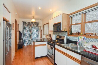 3717 N Janssen Ave, Unit J04P in Chicago, IL - Building Photo - Building Photo