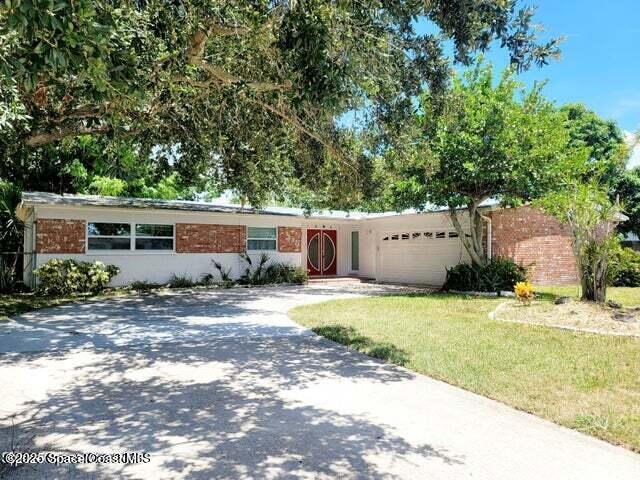 130 Tiki Dr in Merritt Island, FL - Building Photo