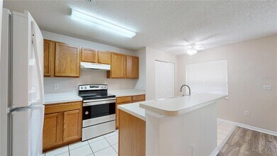 4104 Winding River Way, Unit 2825-3 in Land O Lakes, FL - Building Photo - Building Photo