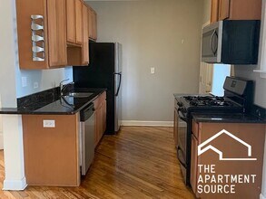 1619 W Wallen Ave, Unit W1 in Chicago, IL - Building Photo - Building Photo