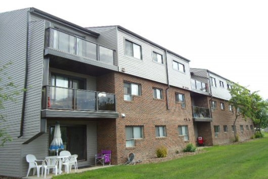 Village Green Apartments in Grande Prairie, AB - Building Photo