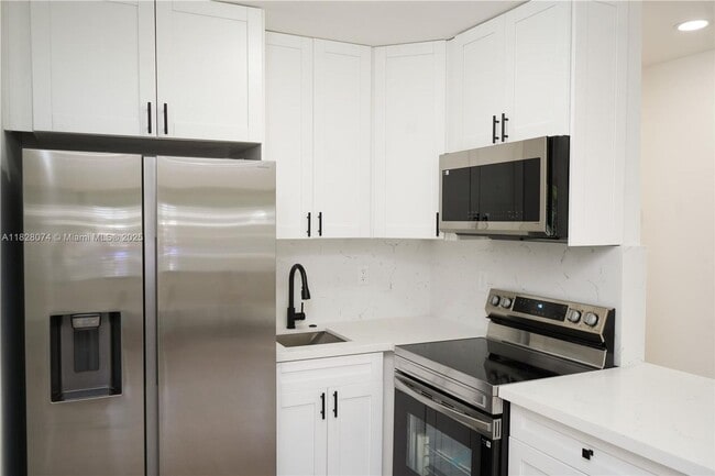 property at 2411 NW 9th St