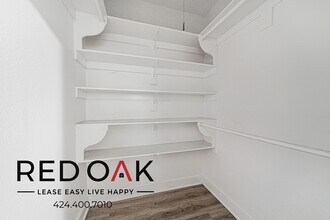 1616 Normandie Ave, Unit 102 in Los Angeles, CA - Foto de edificio - Building Photo