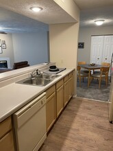 The Apartments At Oakbrook Court in Bloomington, IL - Building Photo - Building Photo