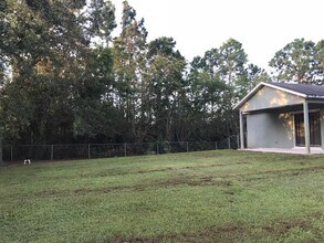 1149 SW Dorchester St in Port St. Lucie, FL - Building Photo - Building Photo
