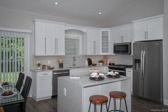 68 Sunlight Walk in Holbrook, NY - Building Photo - Building Photo