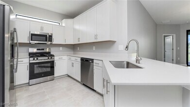 19564 Hinkley Dr in Estero, FL - Building Photo - Building Photo
