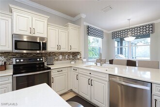 21203 Terni Ct in Estero, FL - Building Photo - Building Photo