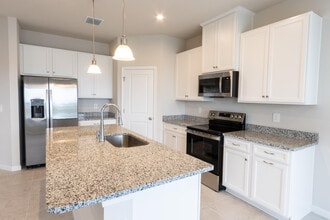 4389 Lago Cir in Winter Beach, FL - Building Photo - Building Photo