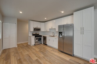 4703 W St Charles Pl in Los Angeles, CA - Building Photo - Building Photo