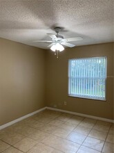 9900 Sweepstakes Ln, Unit GE in Orlando, FL - Building Photo - Building Photo