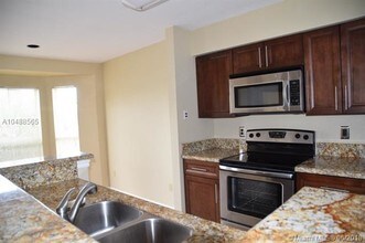 977 Riverside Dr-Unit -221 in Coral Springs, FL - Building Photo - Building Photo