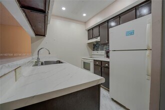 5686 Rock Island Rd in Tamarac, FL - Building Photo - Building Photo