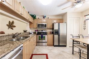 3695 Amberly Cir-Unit -E207 in Naples, FL - Building Photo