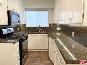 9667 W Olympic Blvd in Beverly Hills, CA - Building Photo - Building Photo