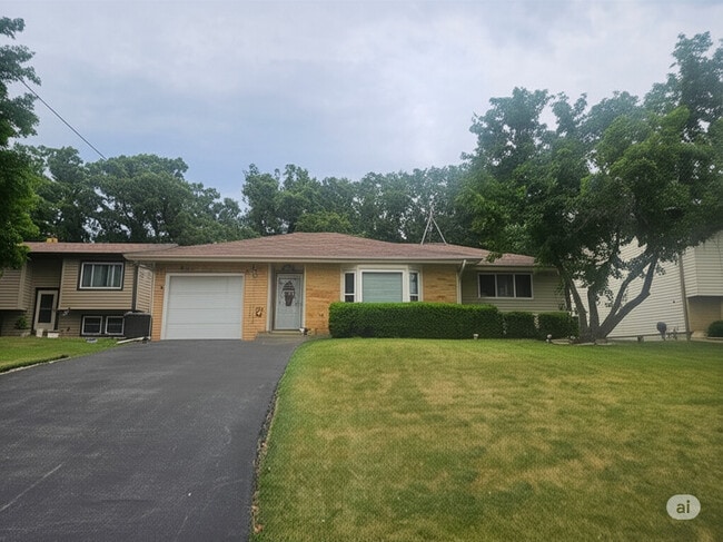 property at 704 Greenbriar Ln