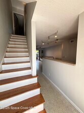 112 E Colonial Ct in Indian Harbour Beach, FL - Building Photo - Building Photo
