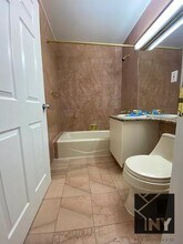 102 Fulton St in New York, NY - Building Photo - Building Photo
