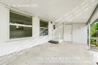 7234 SE Redbird Cir in Hobe Sound, FL - Building Photo - Building Photo