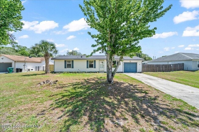 property at 6825 Anecia Ave