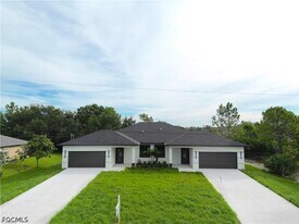 2404 Dickens Ave N in Lehigh Acres, FL - Building Photo