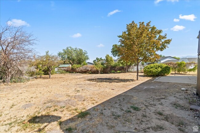 7390 W Candis Pl in Magna, UT - Building Photo - Building Photo