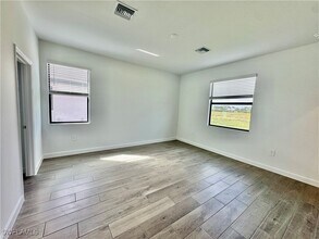 19362 Hinkley Dr in Estero, FL - Building Photo - Building Photo