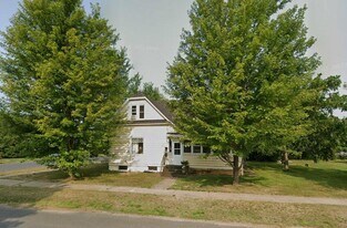 201 N Summit St, Unit Upstairs 1 BR in Spooner, WI - Building Photo