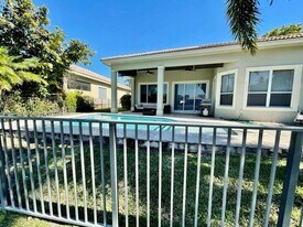 7817 NW 121st Way in Parkland, FL - Building Photo