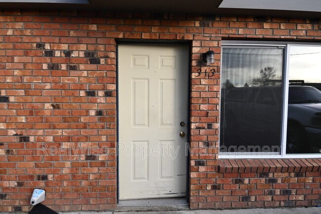 property at 313 NW Tumlin Ave