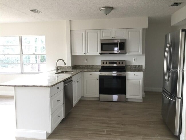 8484 Belmont Rd in Spring Hill, FL - Building Photo - Building Photo