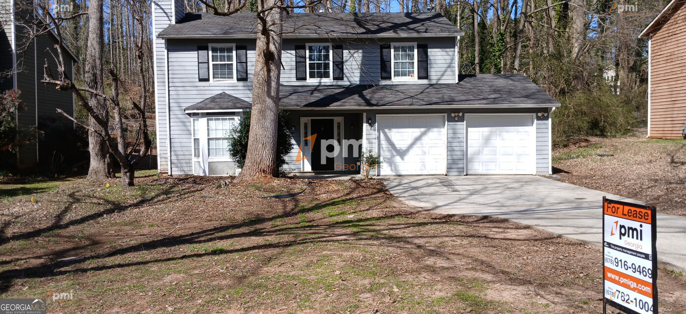 5106 S Woodbridge Trail in Stone Mountain, GA - Building Photo