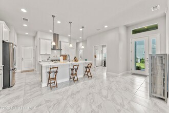 7775 Cache Crk Ln in Melbourne, FL - Building Photo - Building Photo