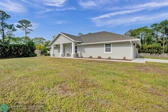 14845 60th Ct N in Loxahatchee, FL - Foto de edificio - Building Photo