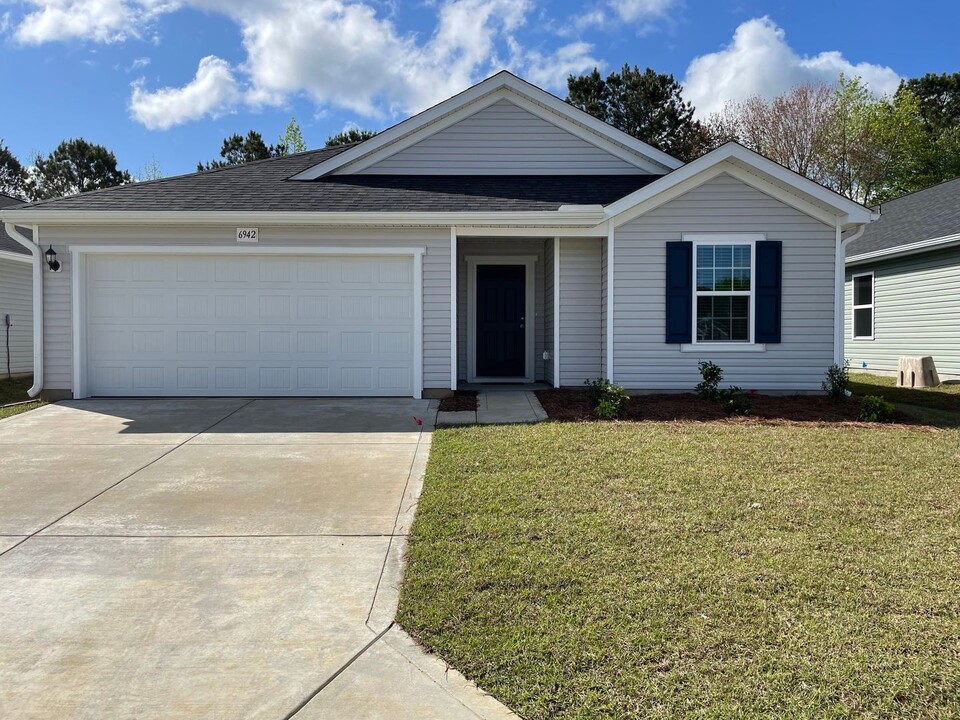 6942 Seaside Palms Pl SW in Sunset Beach, NC - Building Photo