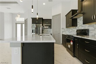 1706 NW 36th Pl in Cape Coral, FL - Building Photo - Building Photo