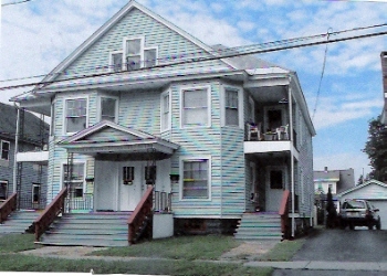 209-211 N Caroline St in Herkimer, NY - Building Photo