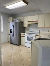8721 Wiles Rd, Unit 107 in Coral Springs, FL - Building Photo - Building Photo