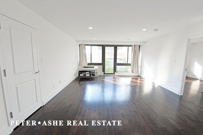 property at 203 E 121st St